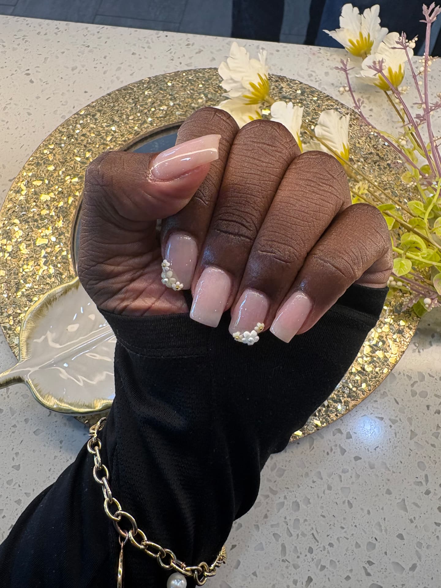 Soft pink square manicure with 3D flower accents