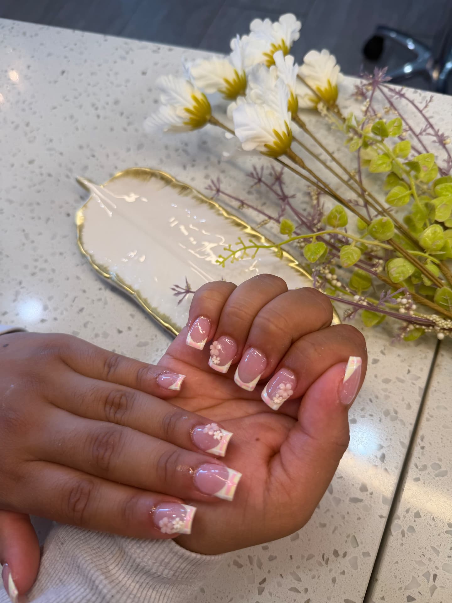 French manicure with pink 3D flower accents