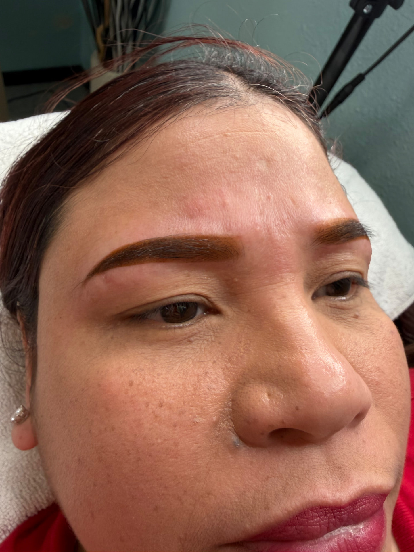 Eyebrow waxing and tint result at Mina Nails